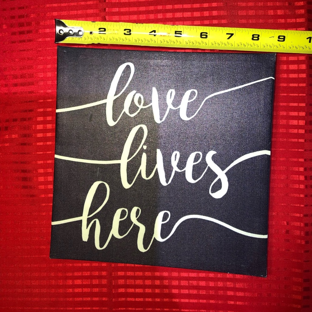 Love lives here sign
